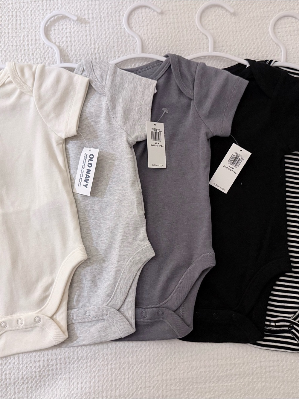 Old Navy 5-Pack Baby One-Piece Bodysuits in Cream, Light Gray, Charcoal, & Black